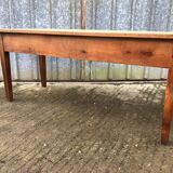 Antique solid cherry farmhouse table with 2 front drawers.