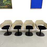 Series of six swivel chairs with organic shell, mottled fabric and base dis