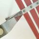 Table basse chrome plateau verre rouge