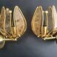 Pair of vintage brass wall sconces with glass shades