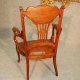 19th century armchair in leather and rosewood inlaid with brass and rosewood