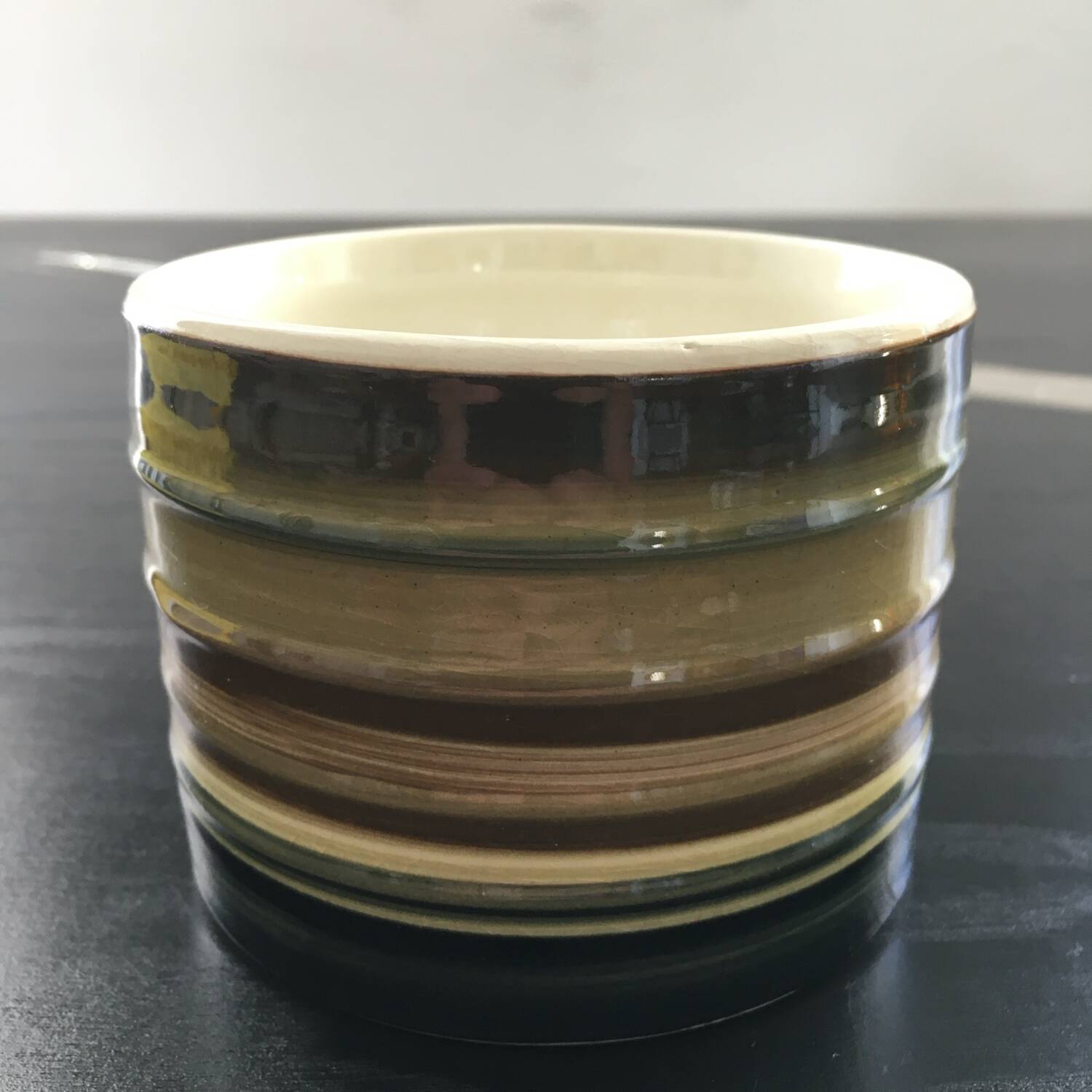 Signed striped flowerpot