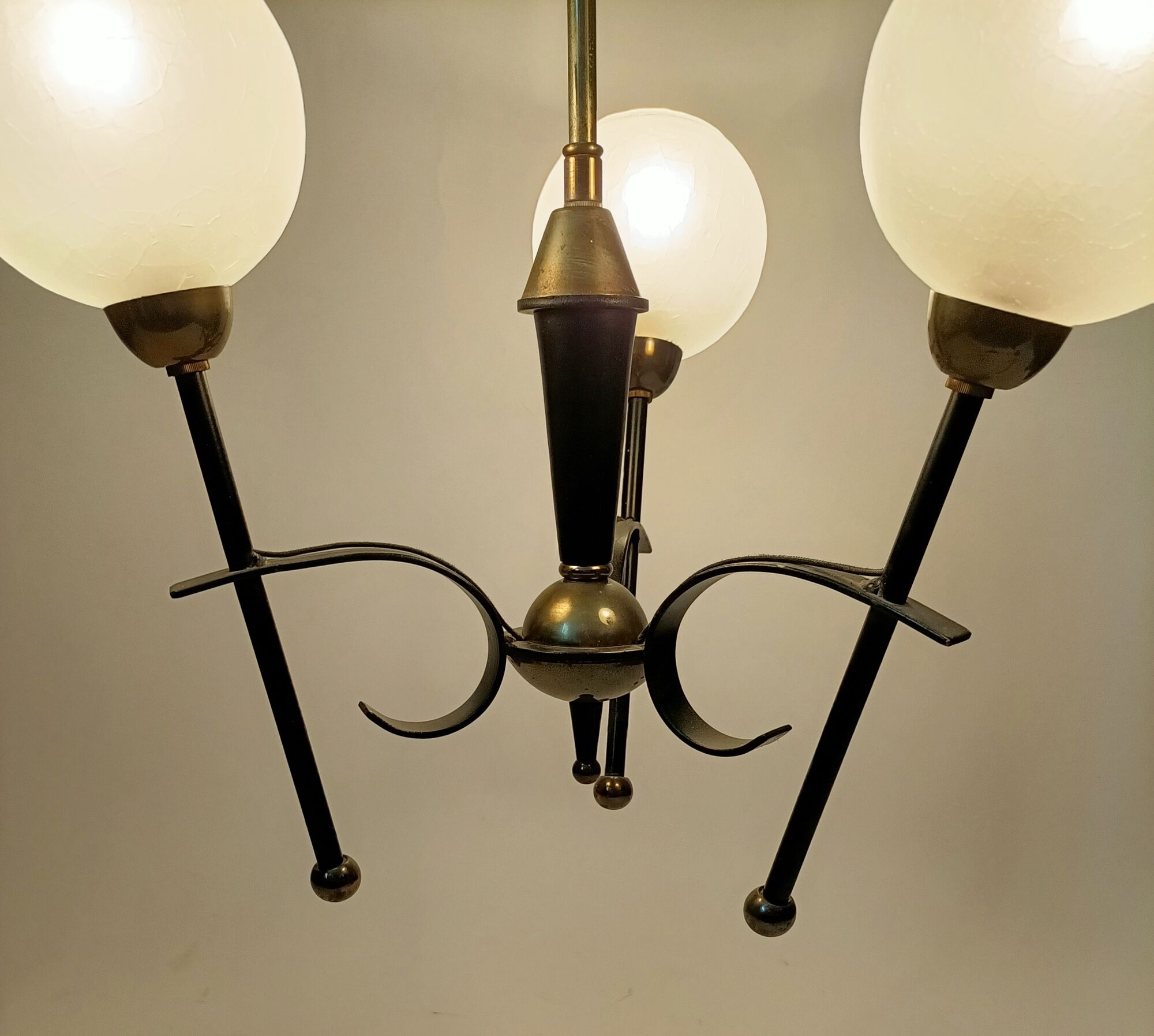 Black and gold lace-up with three arms of vintage 1950 lights