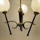 Black and gold lace-up with three arms of vintage 1950 lights