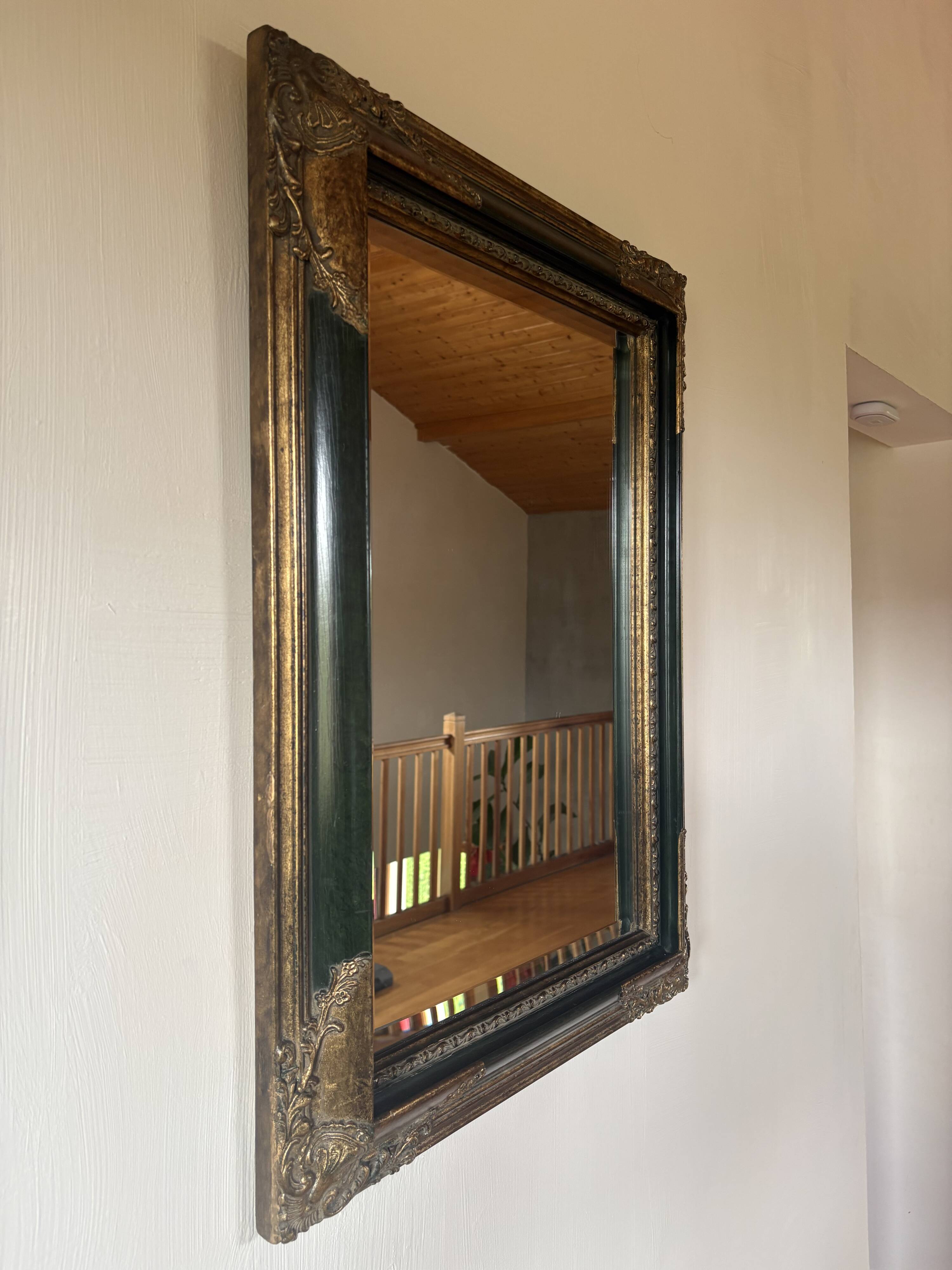 Miroir ancien style Napoléon III en bois noirci et doré – cadre d’orig