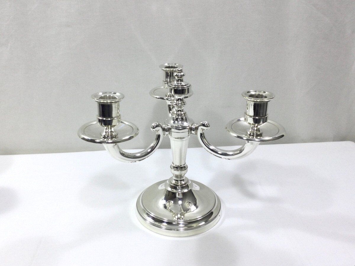 Pair of silver bronze candelabras