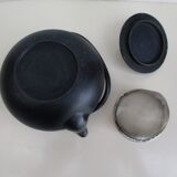 Black cast iron teapot