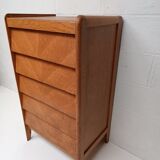 High wooden chest of drawers in the 50s