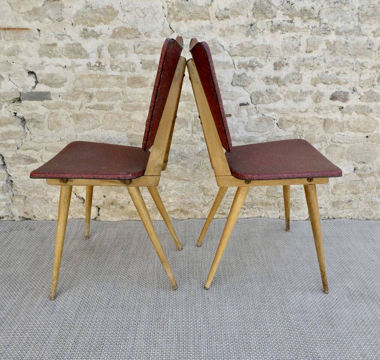 Pair of light wood chairs with Skai, around 1950.