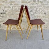 Pair of light wood chairs with Skai, around 1950.