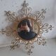 Vintage gold metal sun mirror
