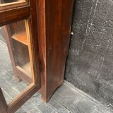 Old narrow wooden showcase.