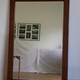 Beveled mirror grooved wood