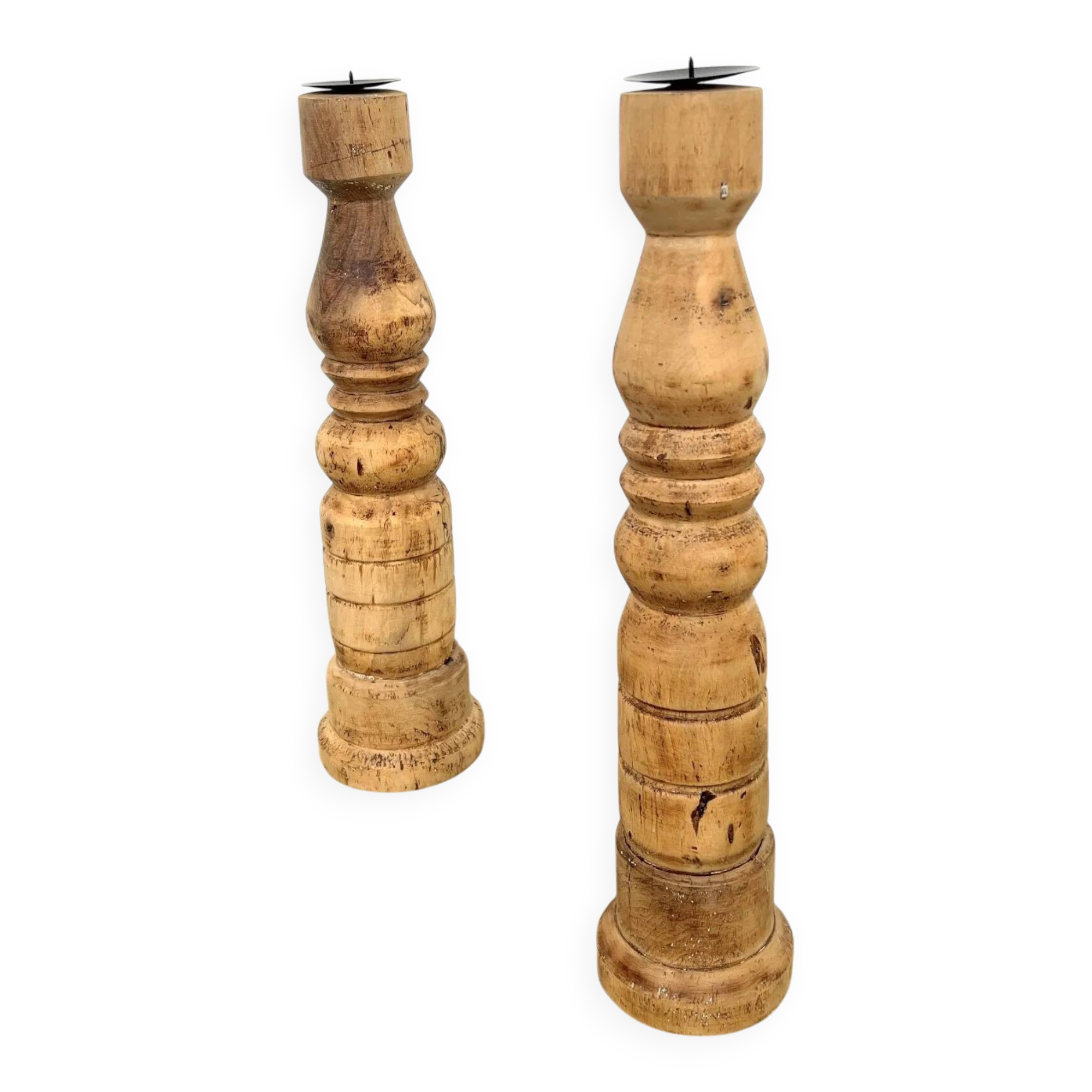 Pair of turned wooden candlesticks, raw and waxed.