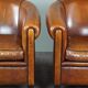 Set of 2 club chairs in black piping sheep leather