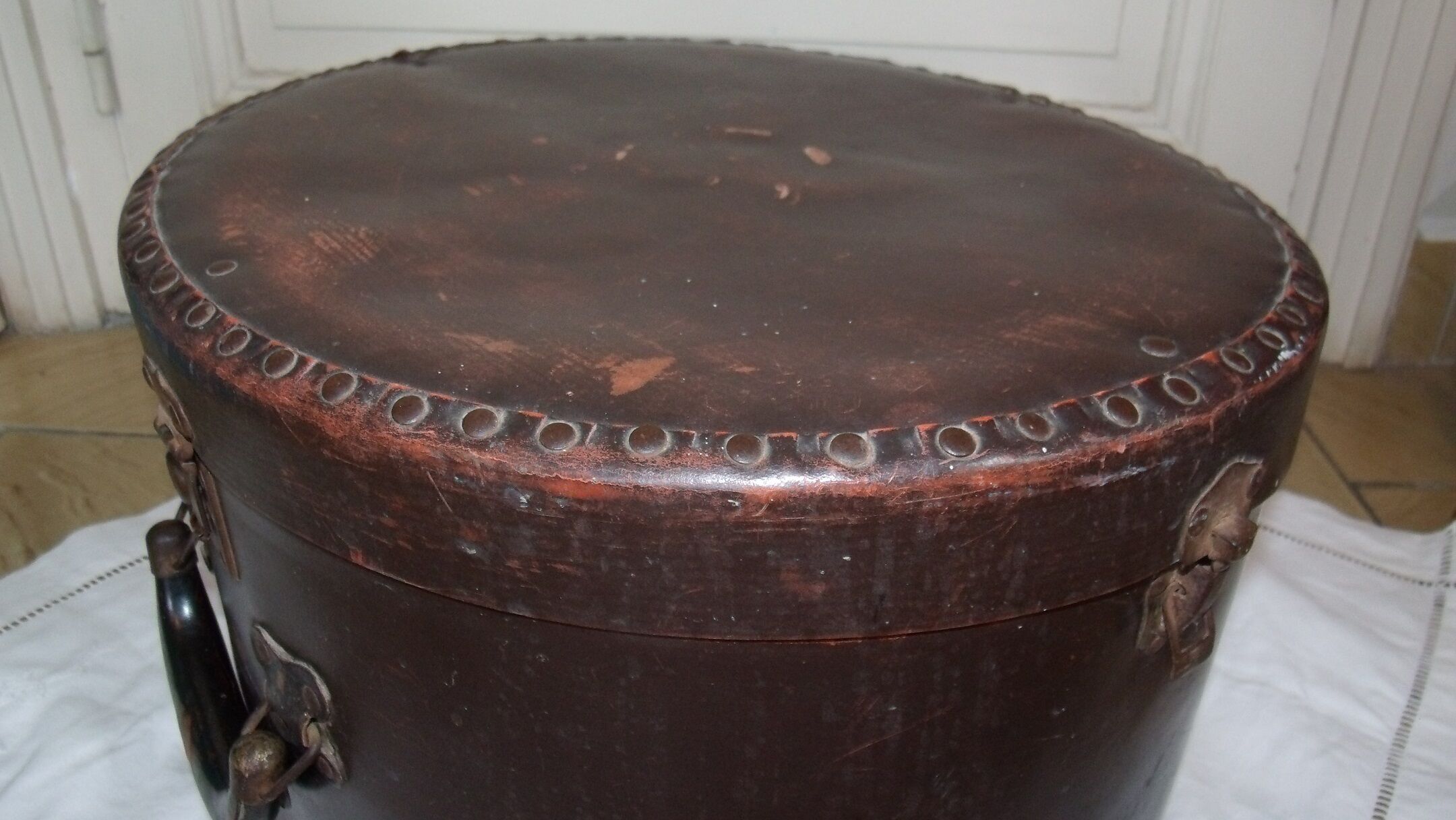 Studded old leather hat box