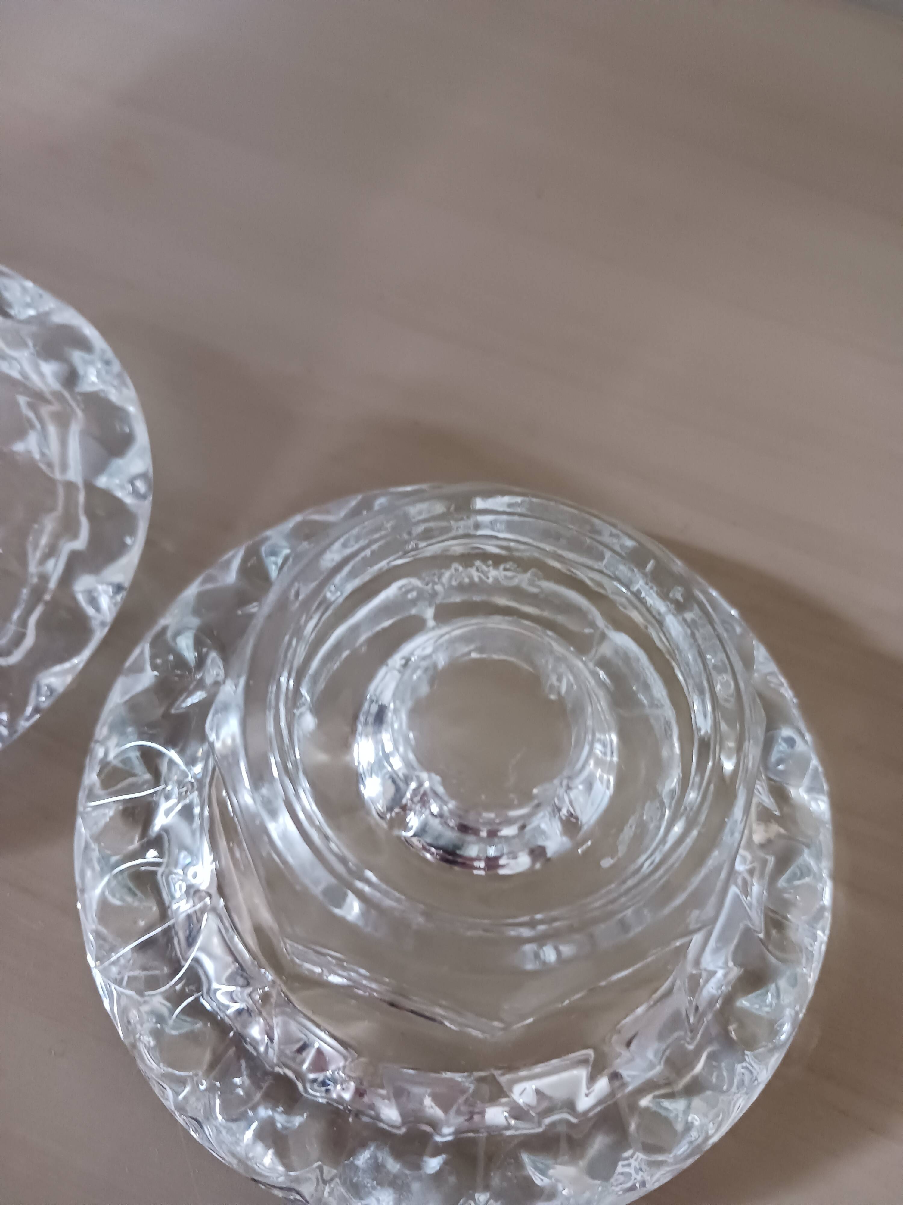 Moulded glass candle holders.