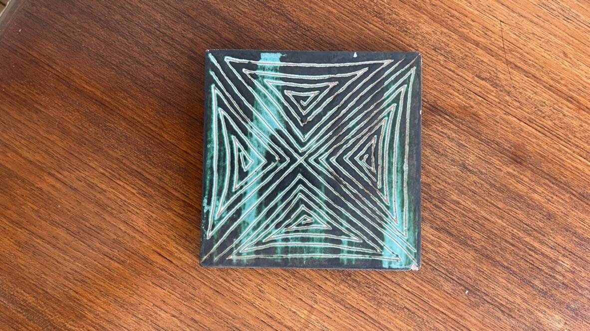 Pair of Robert Picault ceramic trivets with geometric patterns