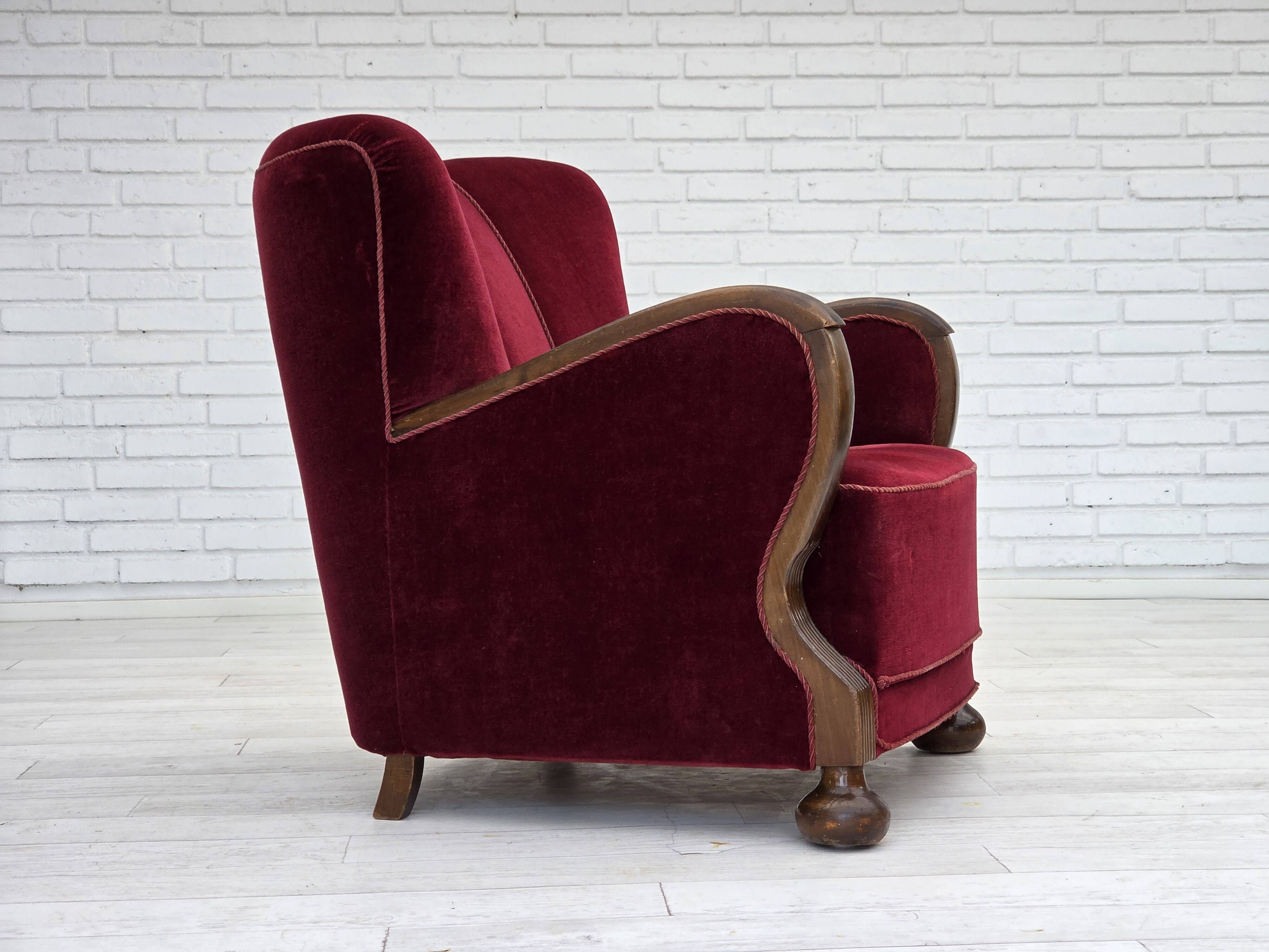 1950s, Danish relax armchair, cherry-red furniture velour, dark beech wood.