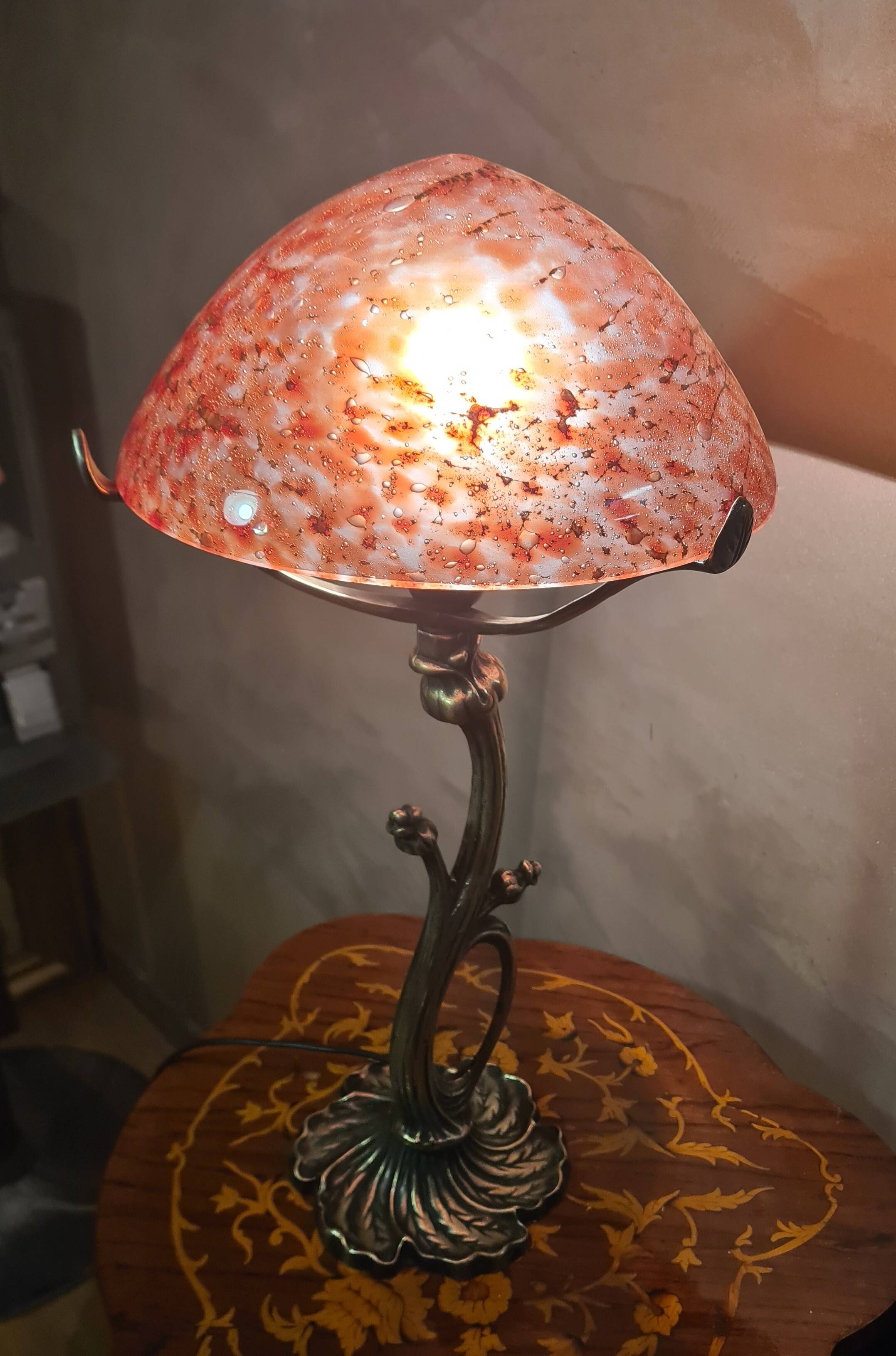 Bronze lamp in Art Nouveau style from 1975 to 1985 with a high-quality glass shade.
