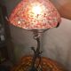 Bronze lamp in Art Nouveau style from 1975 to 1985 with a high-quality glass shade.