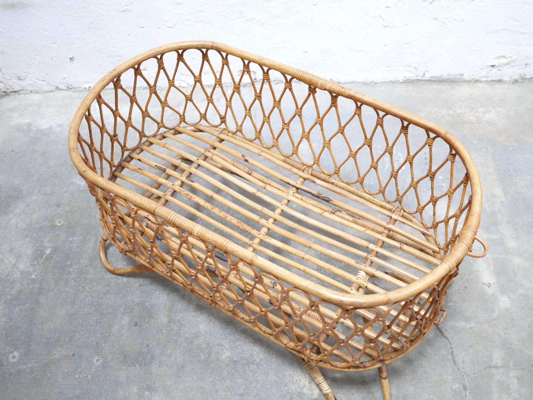 Vintage rattan cradle