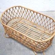 Vintage rattan cradle