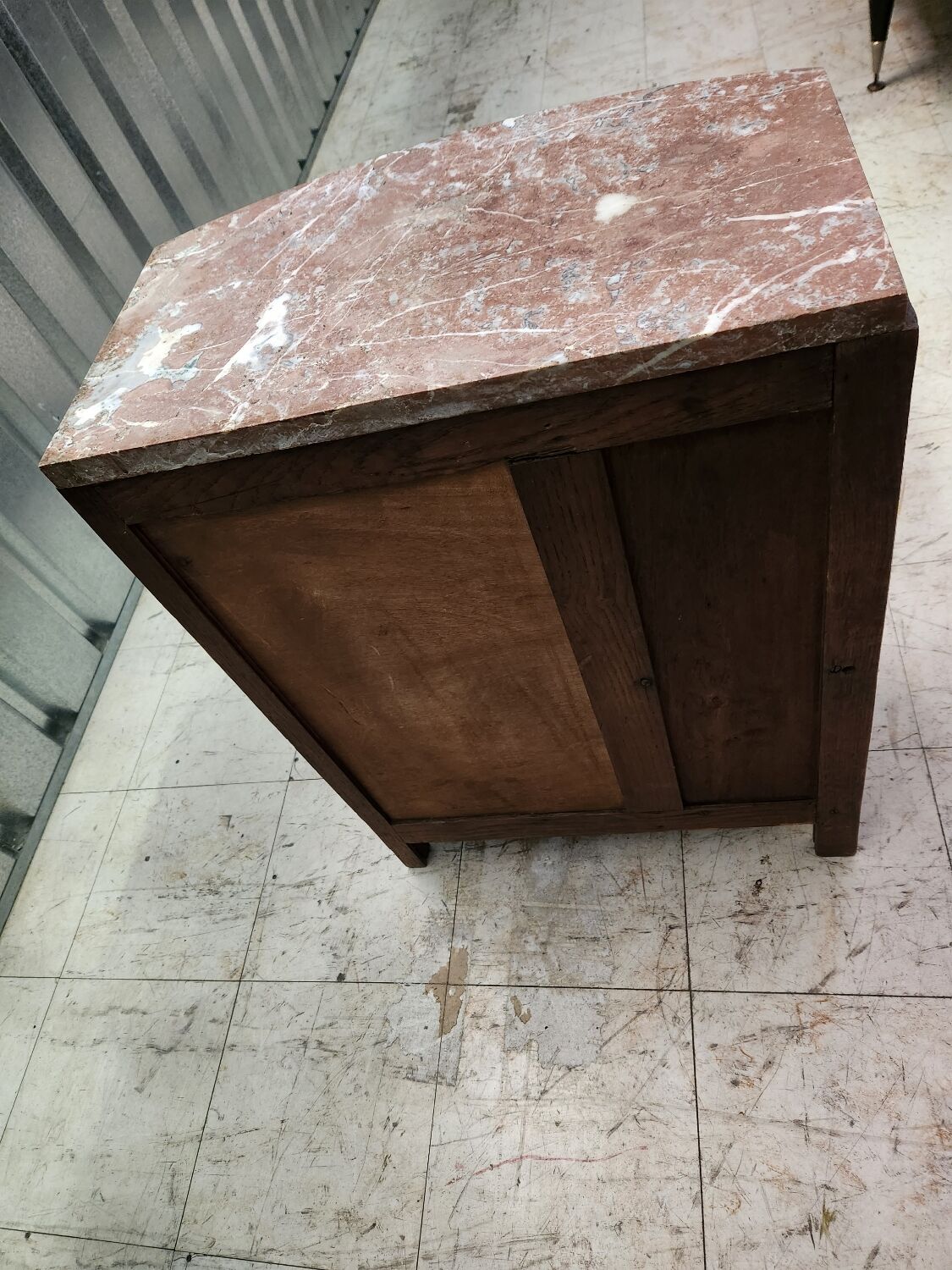 Old bedside table in wood and marble