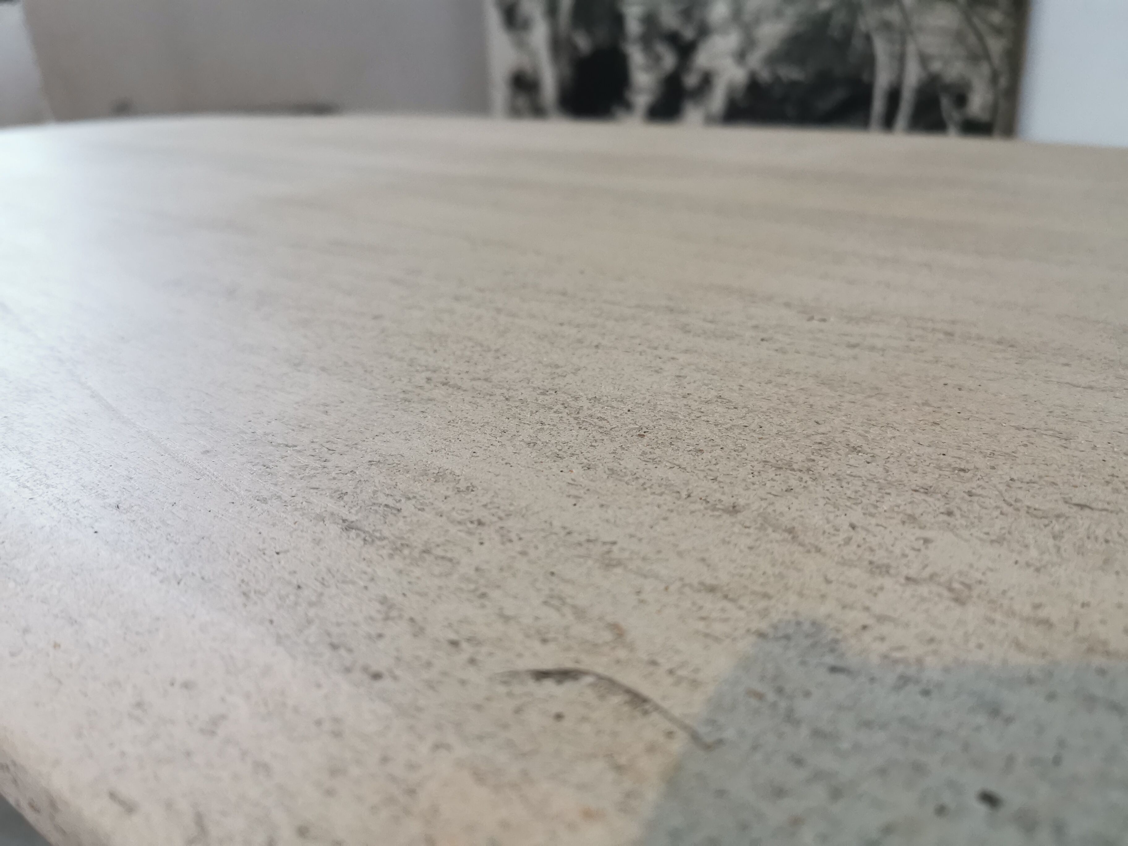Large oval coffee table in travertine and metal