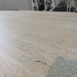 Large oval coffee table in travertine and metal