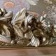 Miroir de cheminée en bois doré à fronton
