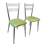 Pair of green vinyl chairs with black steel legs by Colette Gueden