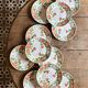 Set of 11 vintage flat plates by Eric de Moulin des Loups.
