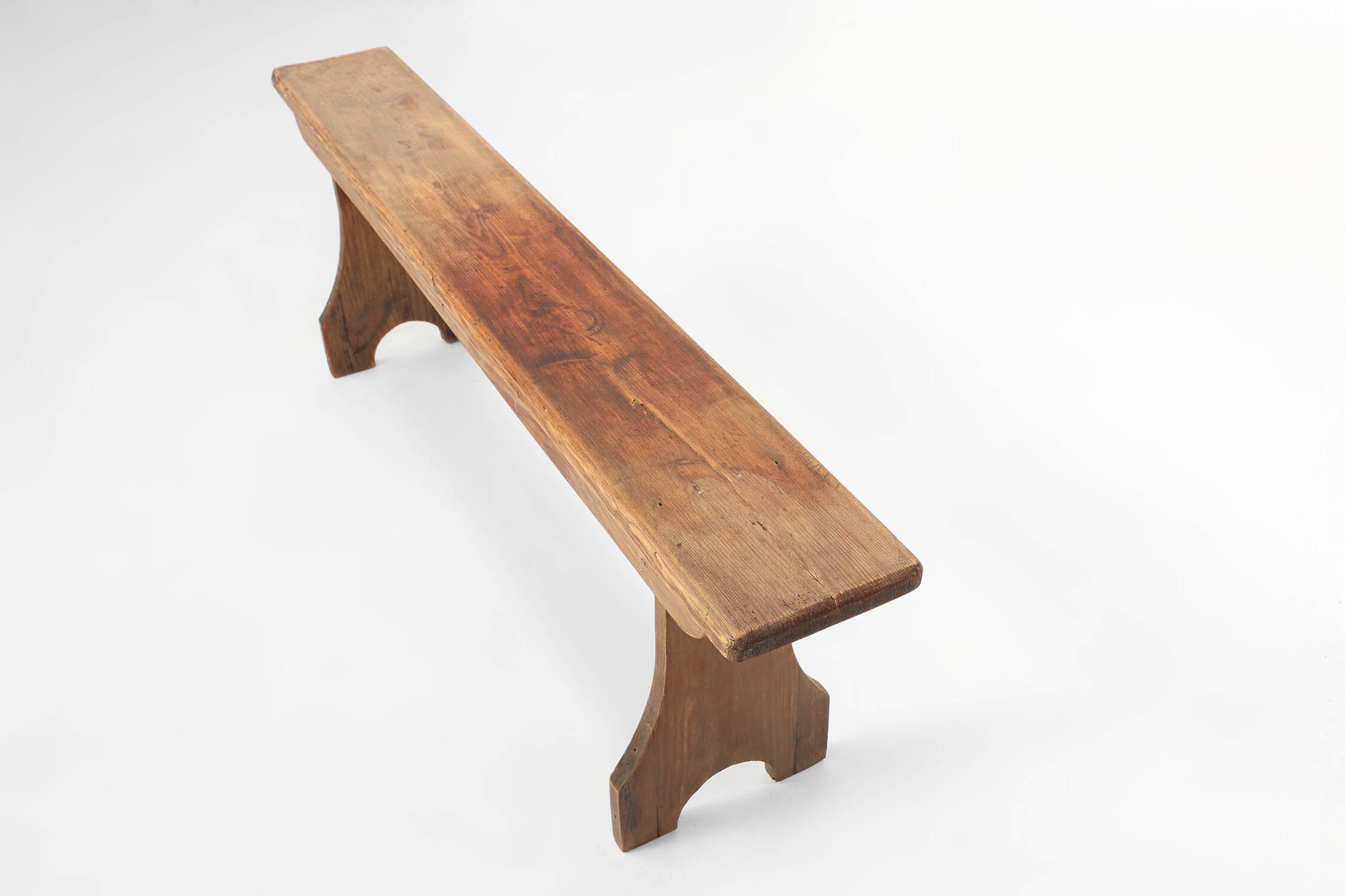 Rustic natural oak wooden bench with rounded details, France ca. 1900
