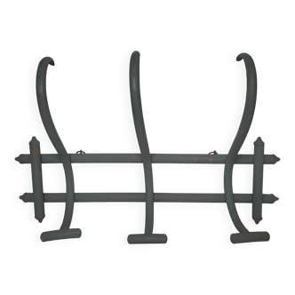 Curved wooden coat rack