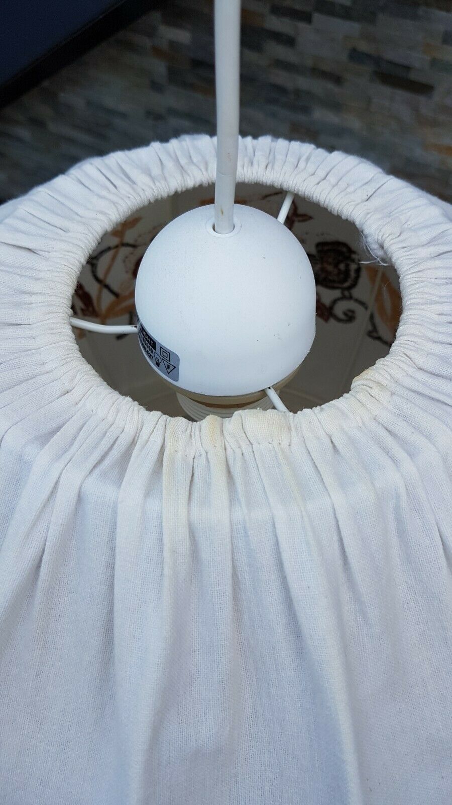 Fringed vintage suspension with brown flowers