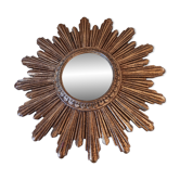 Vintage sun mirror, in gilded wood.