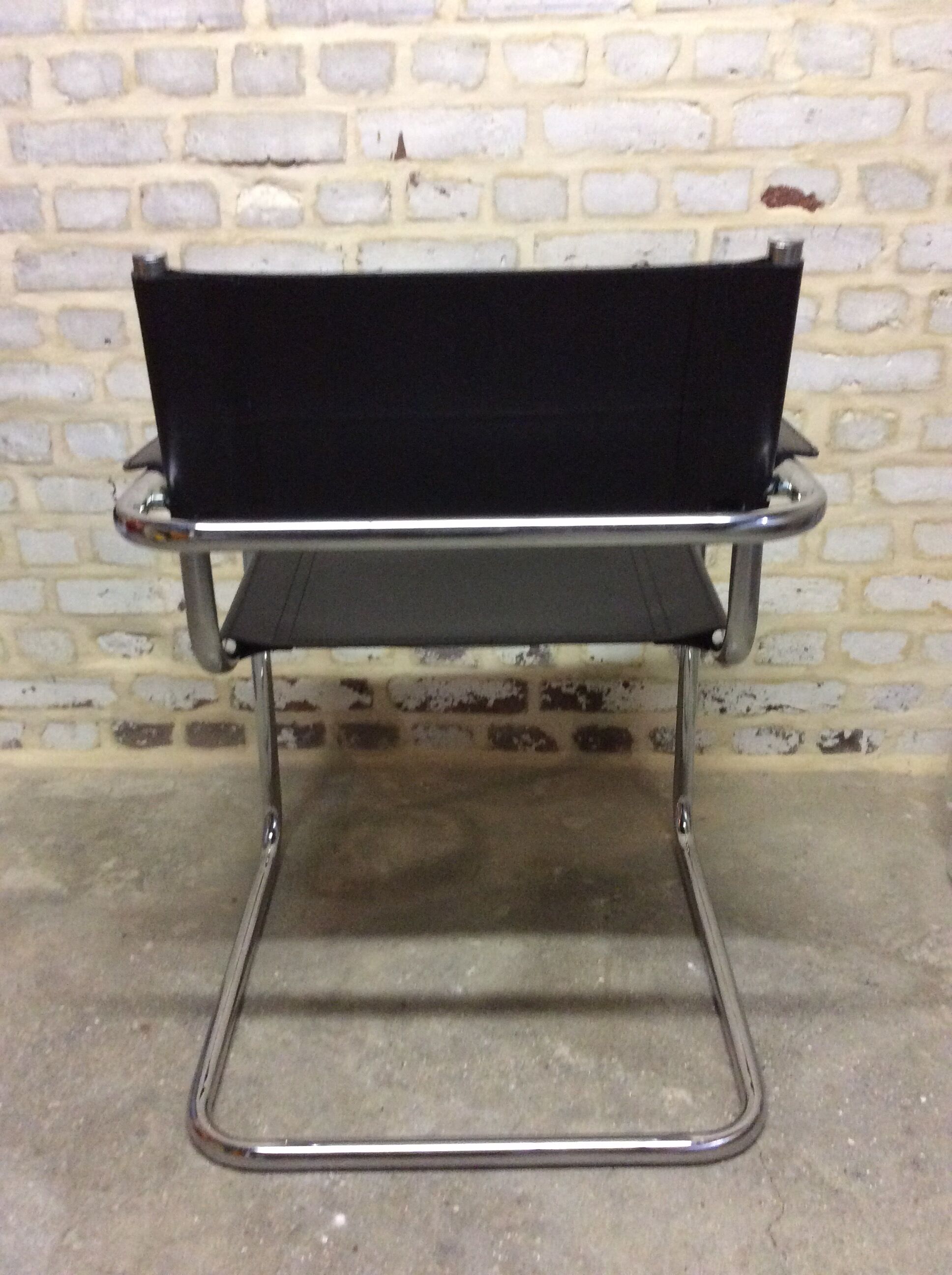 Chair leatherette and brass