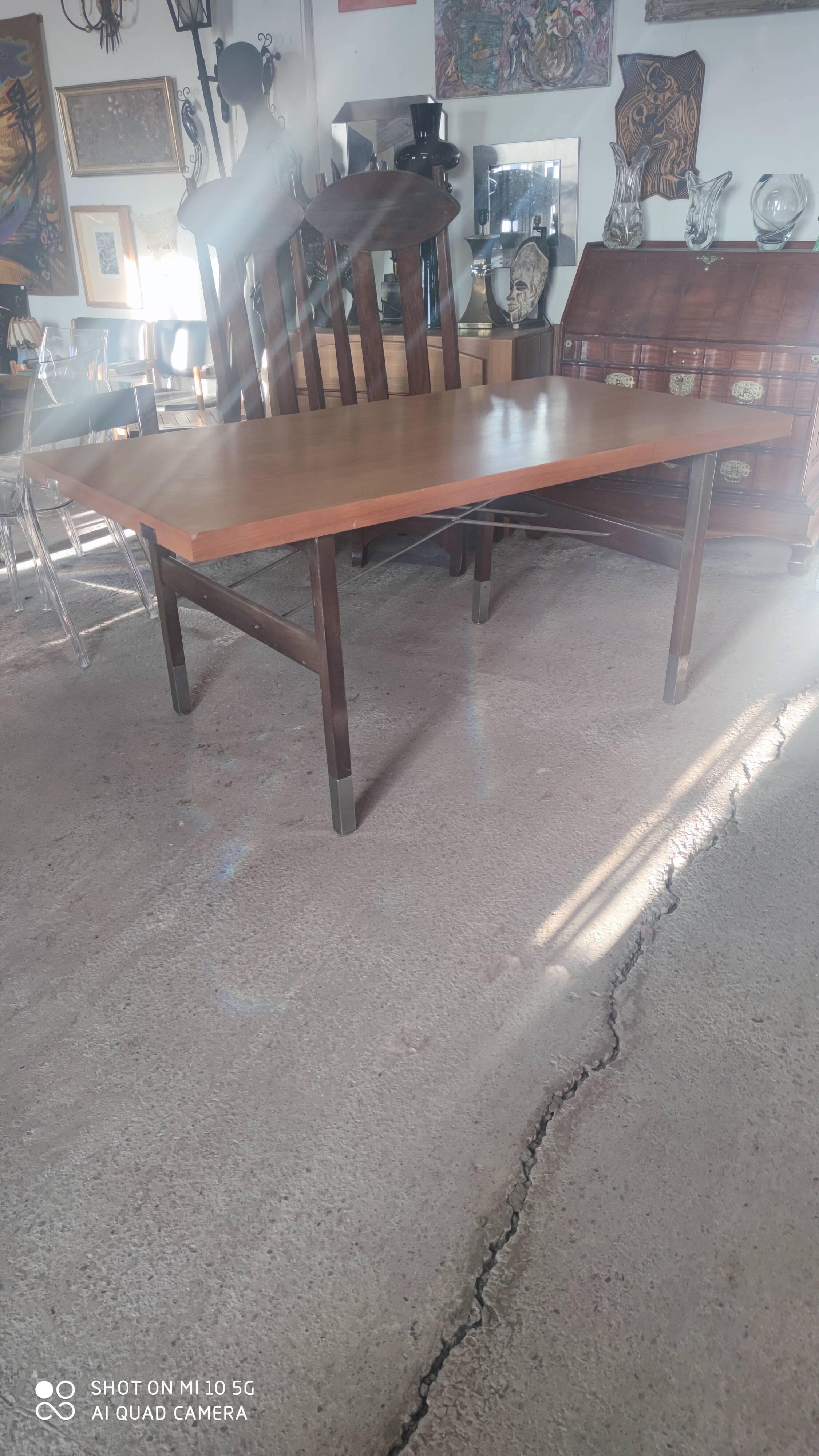 Extendable dining table in walnut, mahogany and chrome, circa 1960
