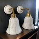 Pair of brass and opaline wall lights
