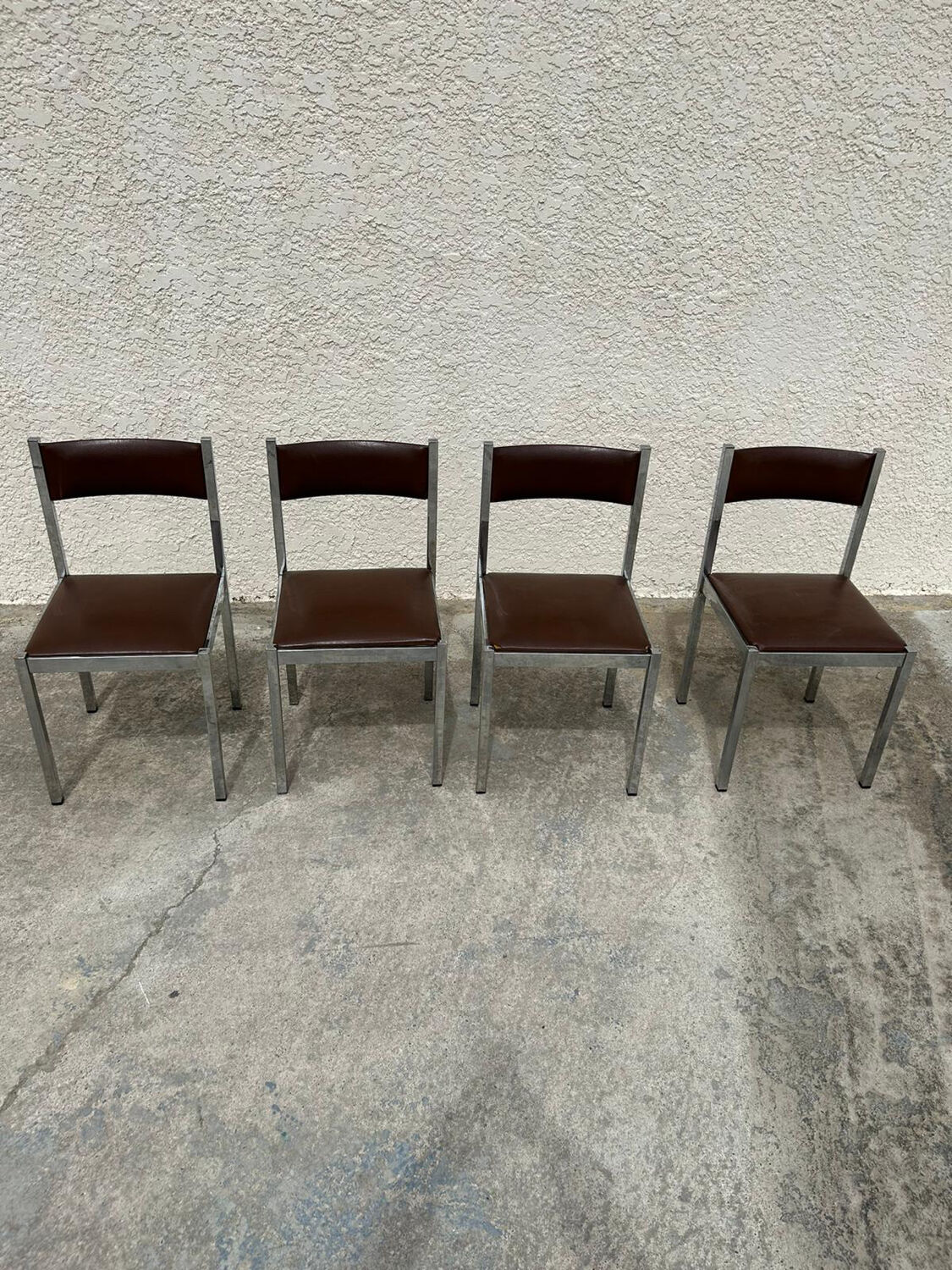 4 vintage leather/iron chairs