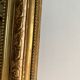 Gilded mirror with frieze h2m10 l:73cm