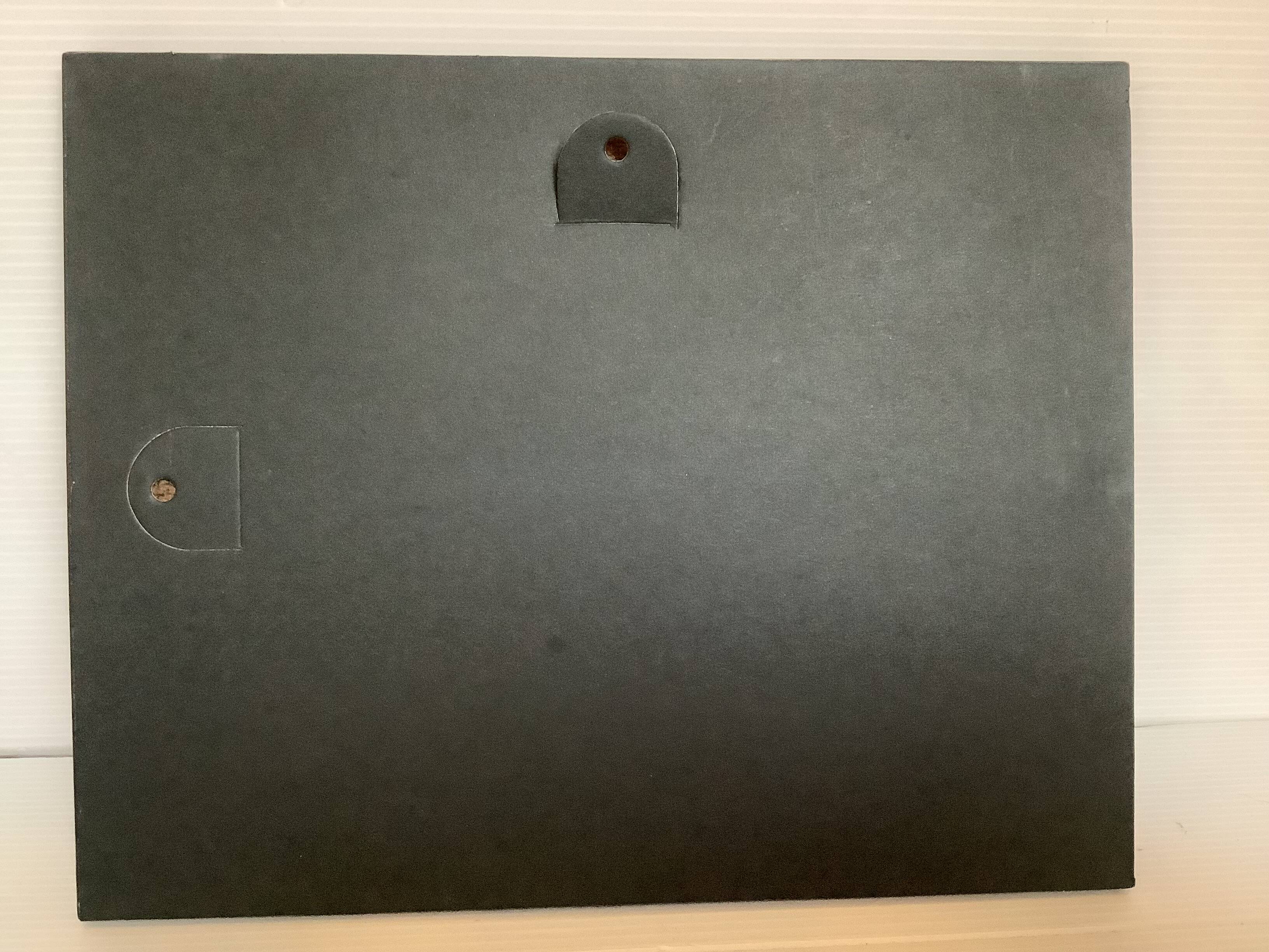 Small marine painting of a boat in oil on panel.