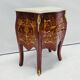 Marquetry chest of drawers with marble top in Louis XV style