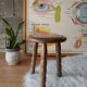 Old farm stool, wooden tripod campaign