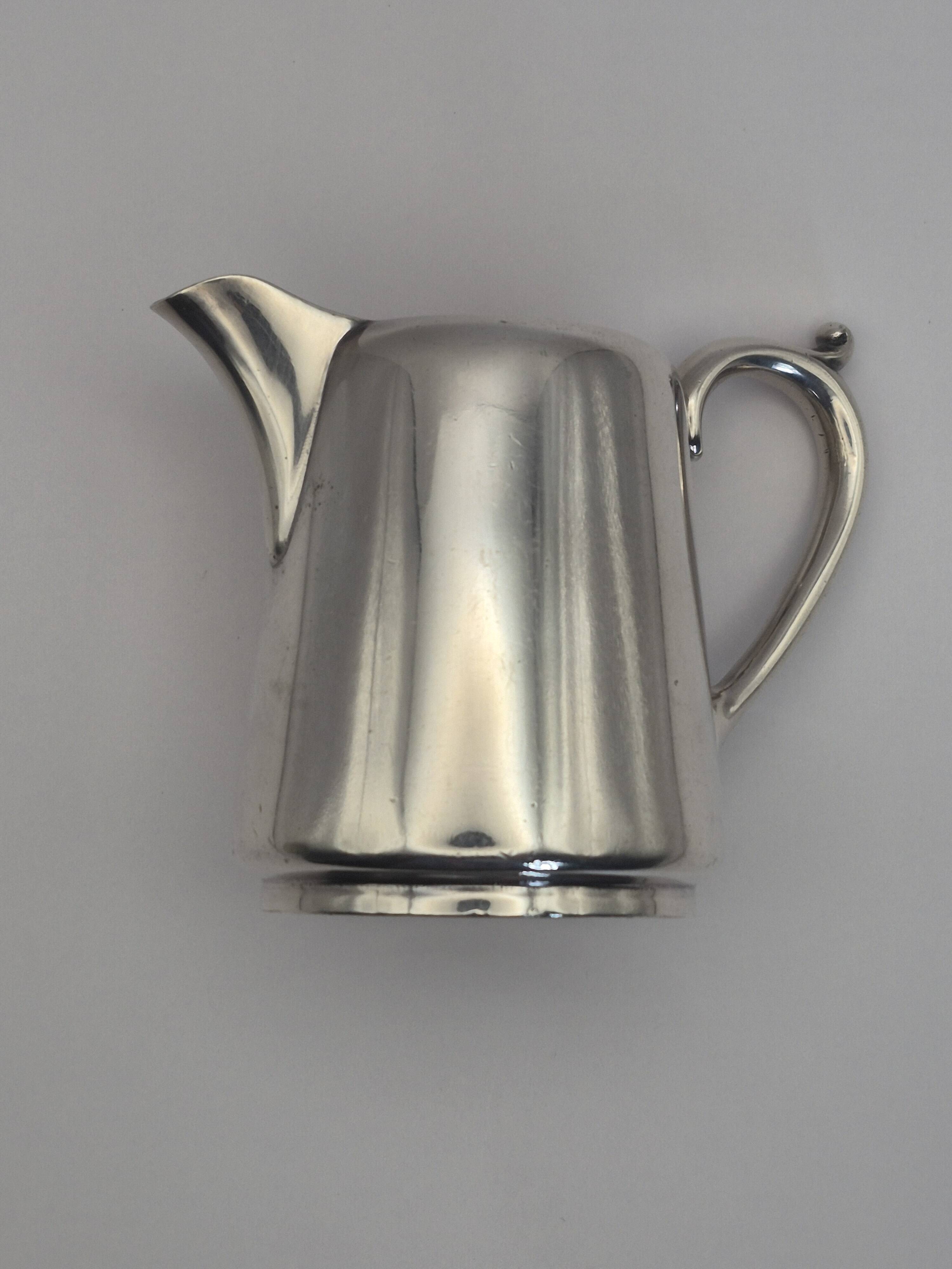 Superb vintage cream jug from the prestigious silversmithing house.
