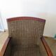 2 armchairs in woven rattan and wood, 1980s