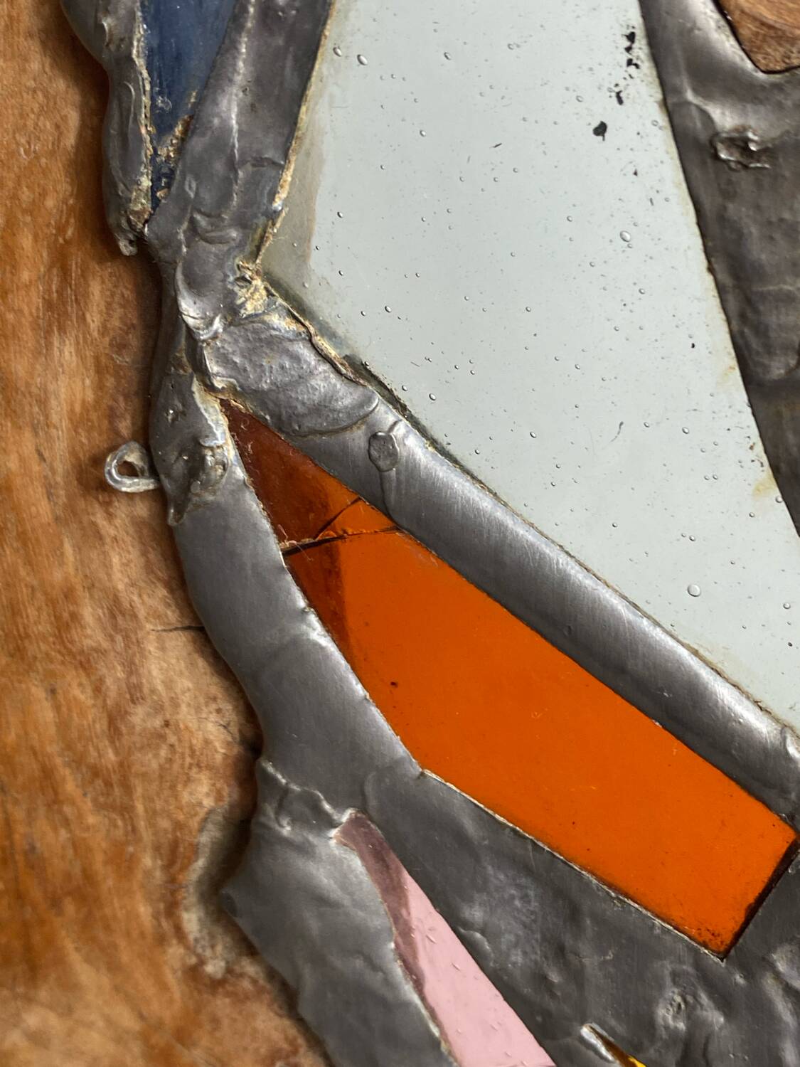 Carved wooden lamp and stained glass