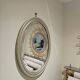 Bevelled oval mirror