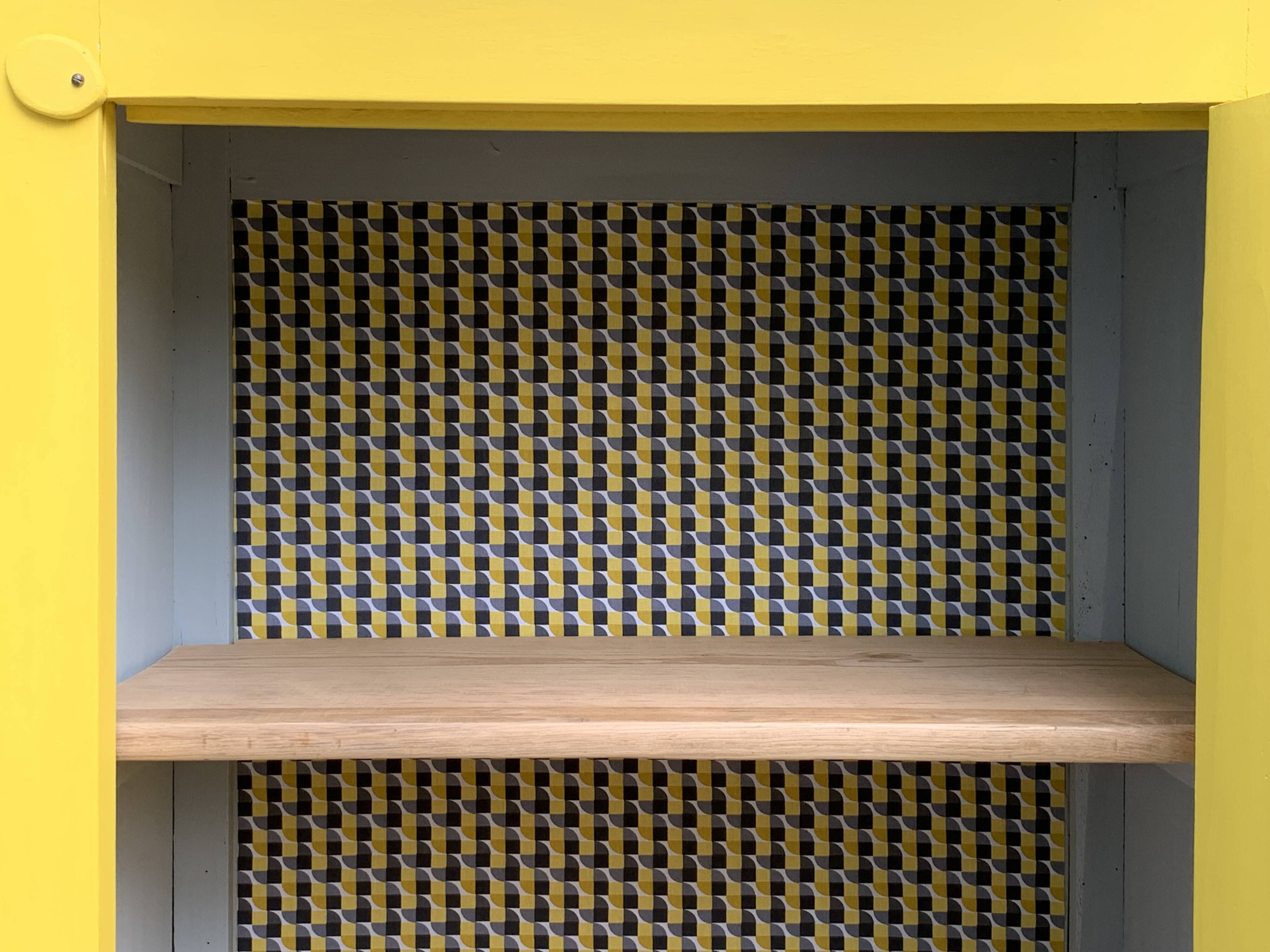 Antique powder yellow Parisian bonnetière wardrobe.